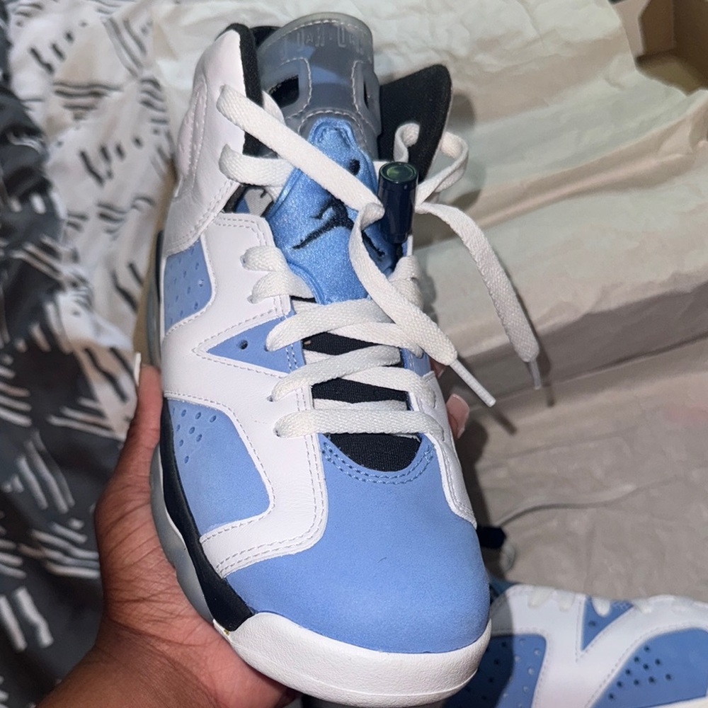 Jordan Blue and White Sneakers with Iconic Air Design